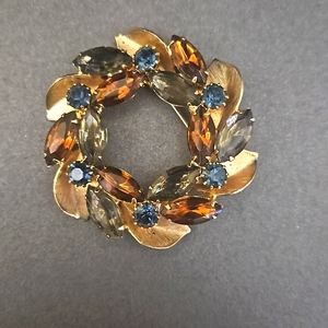 Gold tone brushed brooch